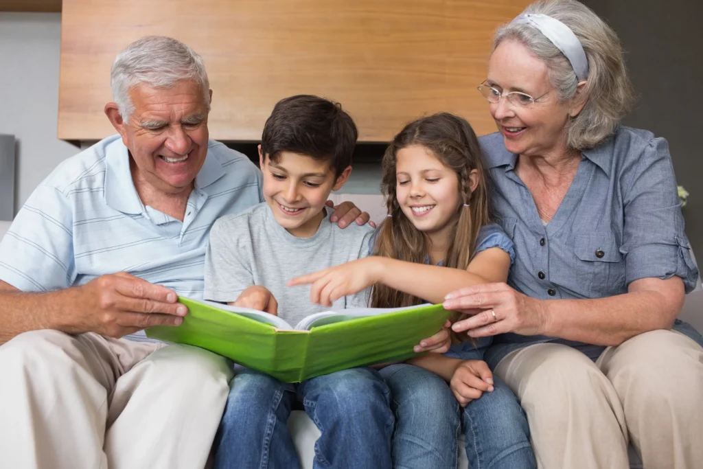 Grandparents reading with their grandkids.